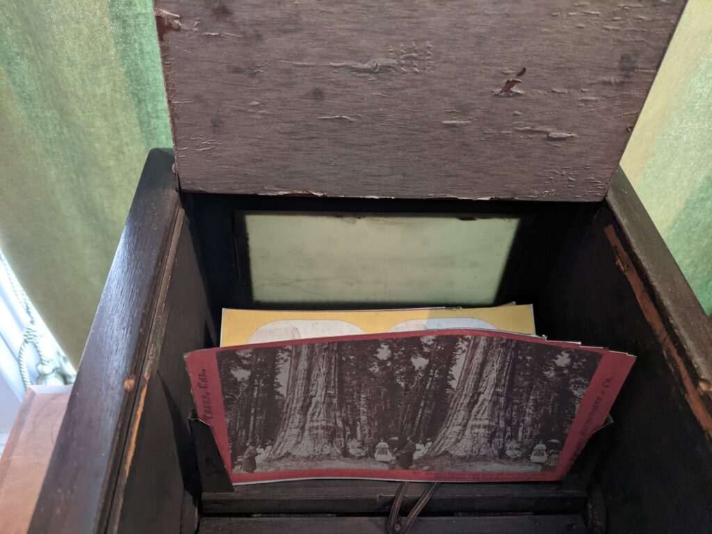Inside of our Becker Viewer where multiple stereoscope cards can be loaded so guests can rotate through them.